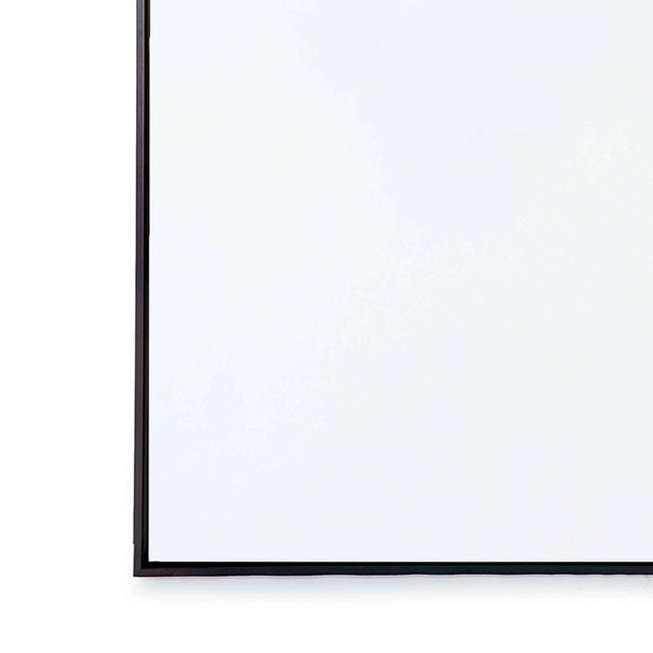 Bottom left corner of a Regina Andrew Rectangle Hanging Mirror